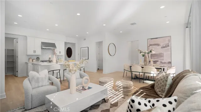 a bedroom with a large bed and a large window