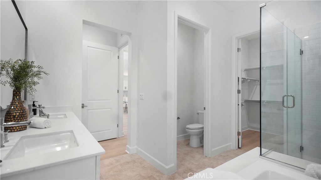 138 Jayhawk Irvine, CA 92602 - Photo 20 of 50 a bathroom with a sink and a mirror