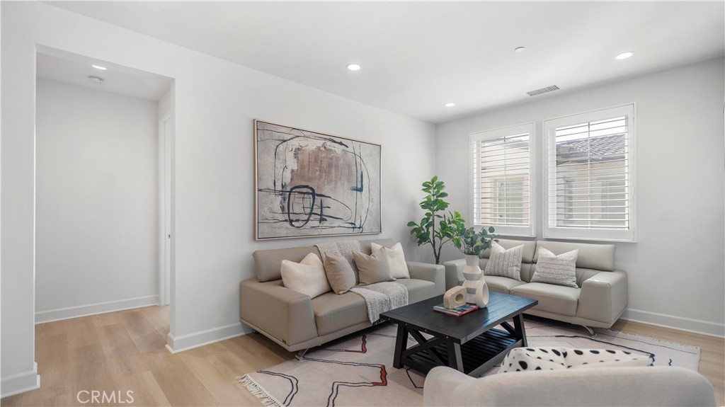 138 Jayhawk Irvine, CA 92602 - Photo 24 of 50 a living room with furniture and a window