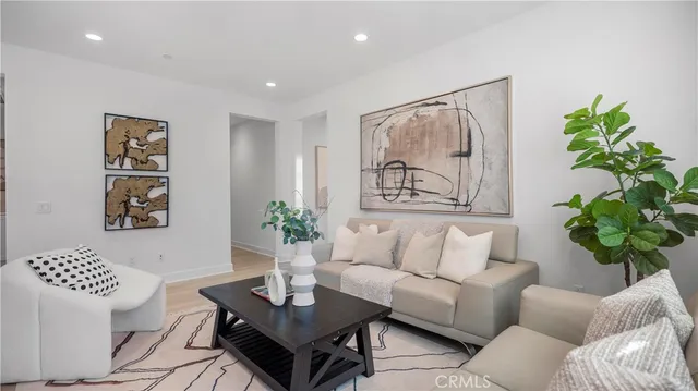 a living room with furniture and window