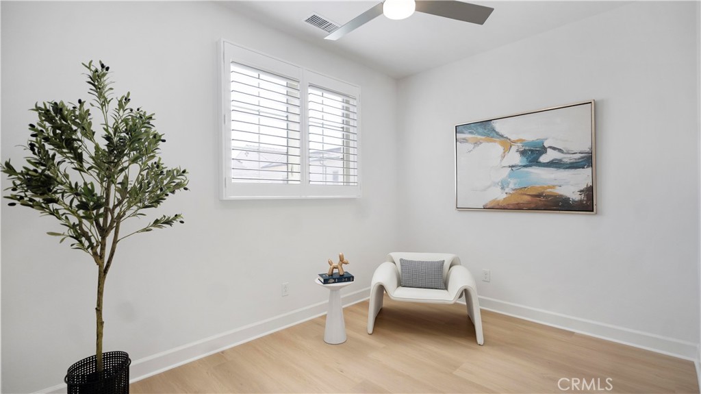 138 Jayhawk Irvine, CA 92602 - Photo 30 of 50 a living room with furniture and a potted plant