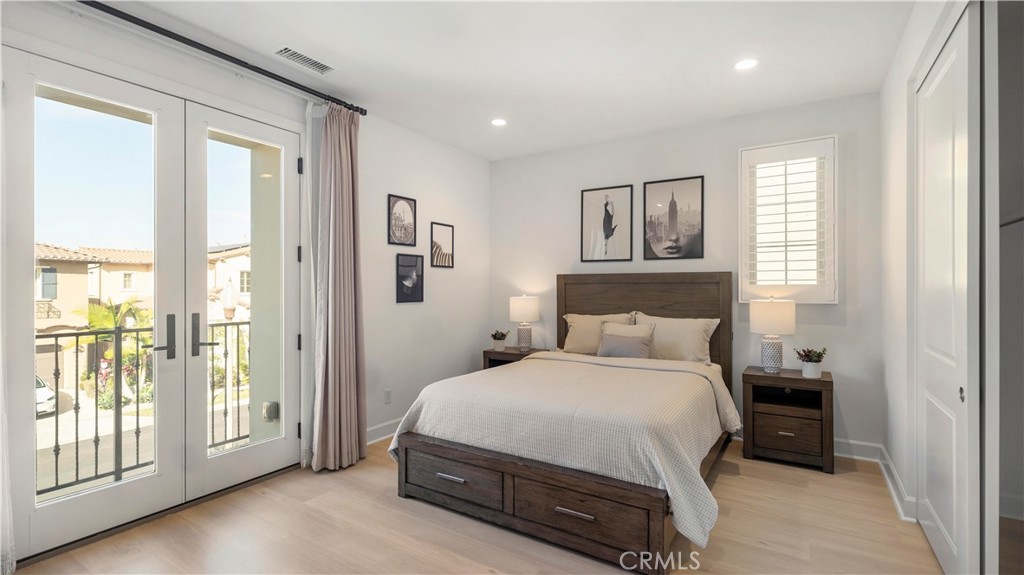 138 Jayhawk Irvine, CA 92602 - Photo 36 of 50 a bedroom with a large bed and a window