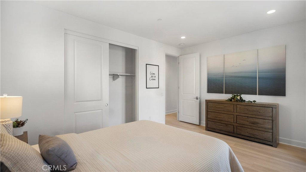 138 Jayhawk Irvine, CA 92602 - Photo 37 of 50 a bedroom with a bed and a dresser