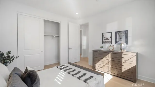 a view of storage and utility room with washer and dryer