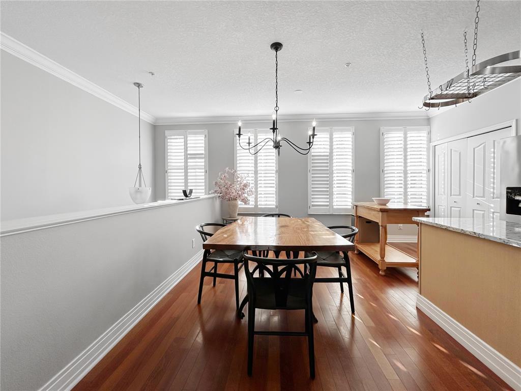 1468 Harbour Walk Road Tampa, FL 33602 - Photo 16 of 40 a large kitchen with a table and chairs