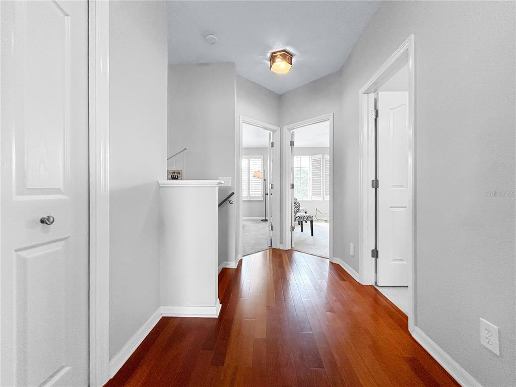 1468 Harbour Walk Road Tampa, FL 33602 - Photo 18 of 40 a view of a big room with wooden floor and windows