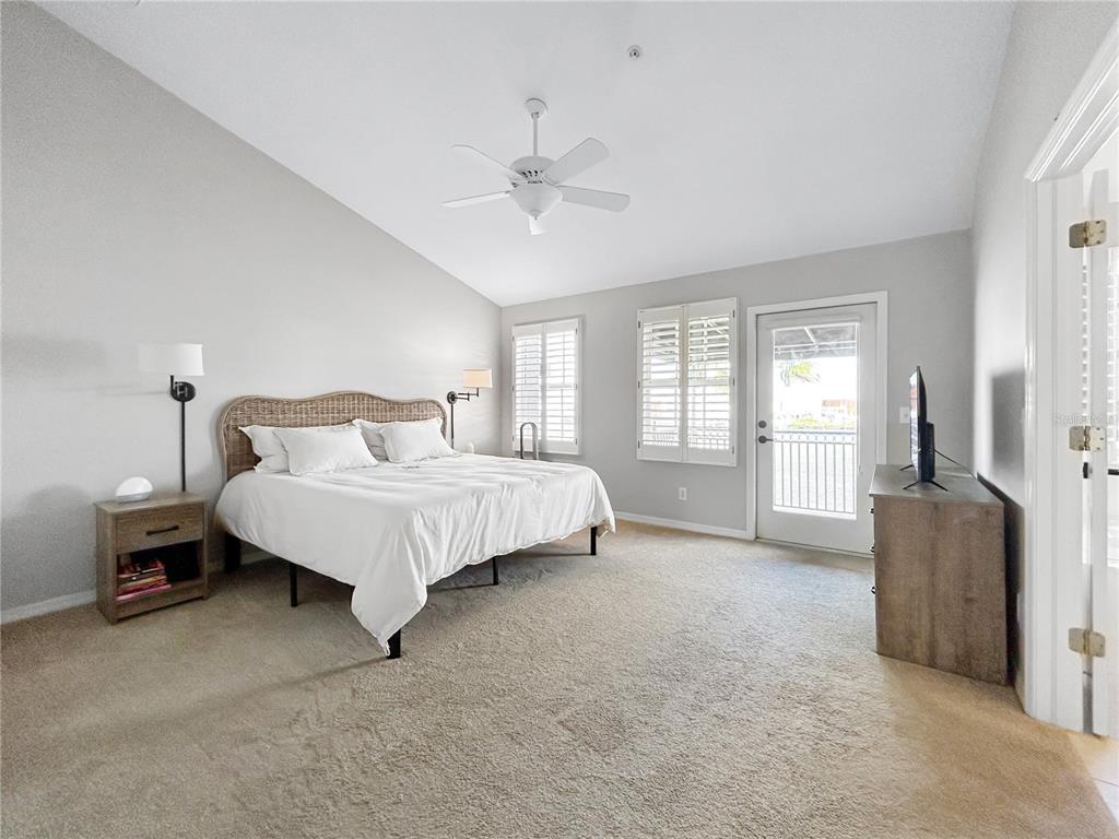 1468 Harbour Walk Road Tampa, FL 33602 - Photo 19 of 40 a bedroom with a bed and a couch