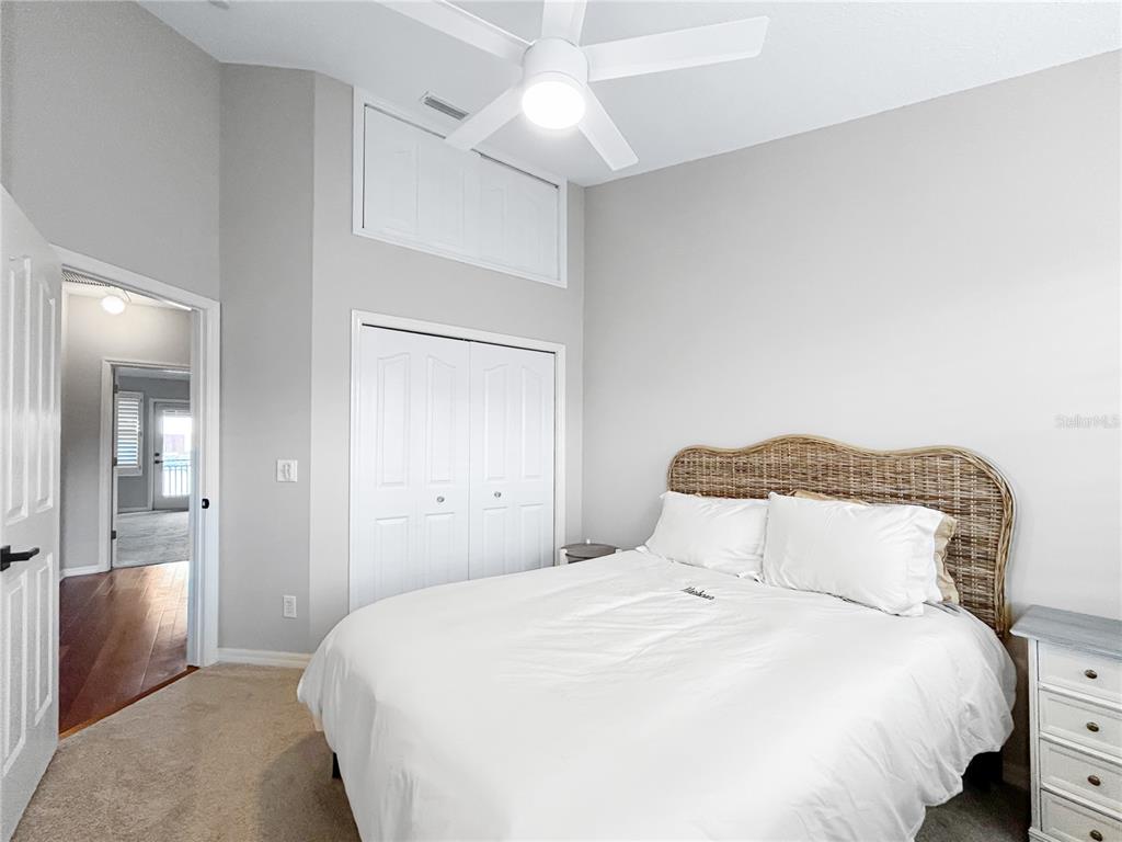 1468 Harbour Walk Road Tampa, FL 33602 - Photo 24 of 40 a bedroom with a bed and a lamp
