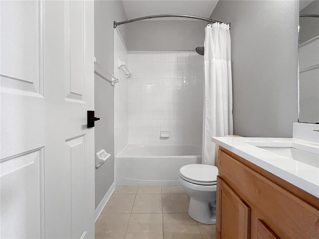 1468 Harbour Walk Road Tampa, FL 33602 - Photo 29 of 40 a bathroom with a sink a toilet and shower