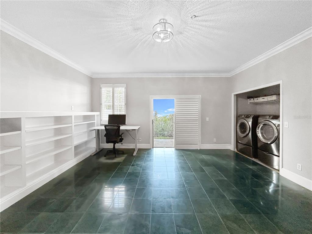 1468 Harbour Walk Road Tampa, FL 33602 - Photo 34 of 40 a living room with furniture and a fireplace