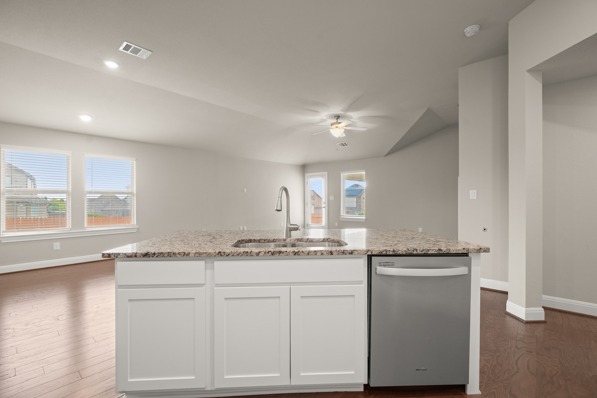 2209 Hat Bender Loop Round Rock, TX 78664 - Photo 6 of 25 a bathroom with a granite countertop sink and a mirror