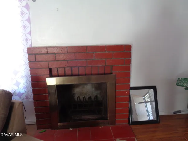 a white toilet sitting next to a shower