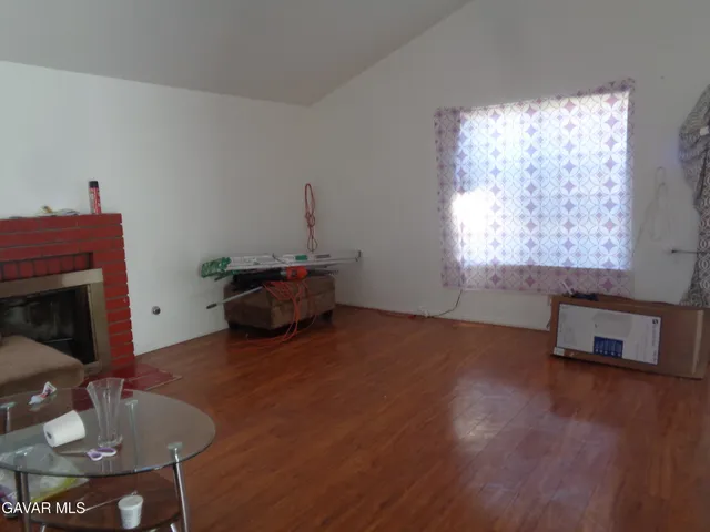 a view of small space with wooden floor