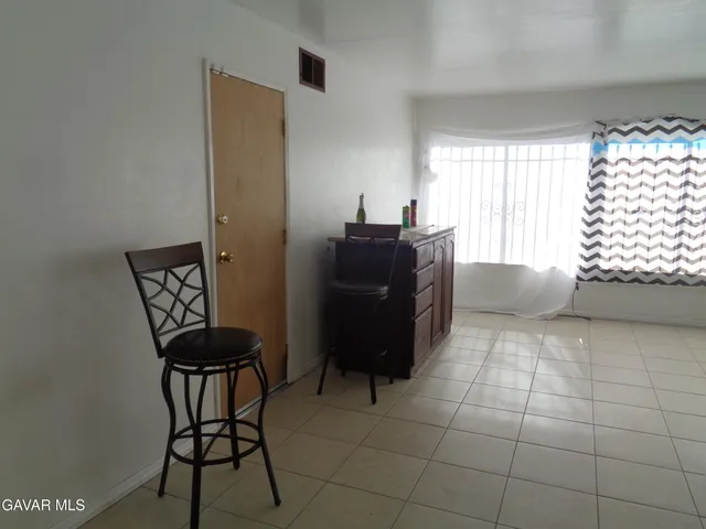 a view of a backyard of the house