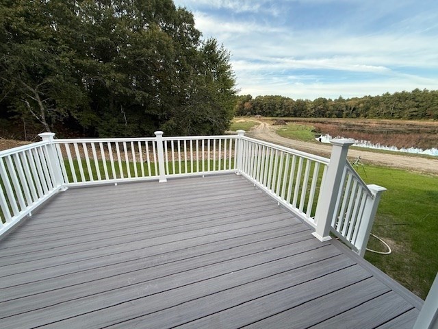31 Cross Road Rochester, MA 02770 - Photo 7 of 8 a balcony with wooden floor and fence