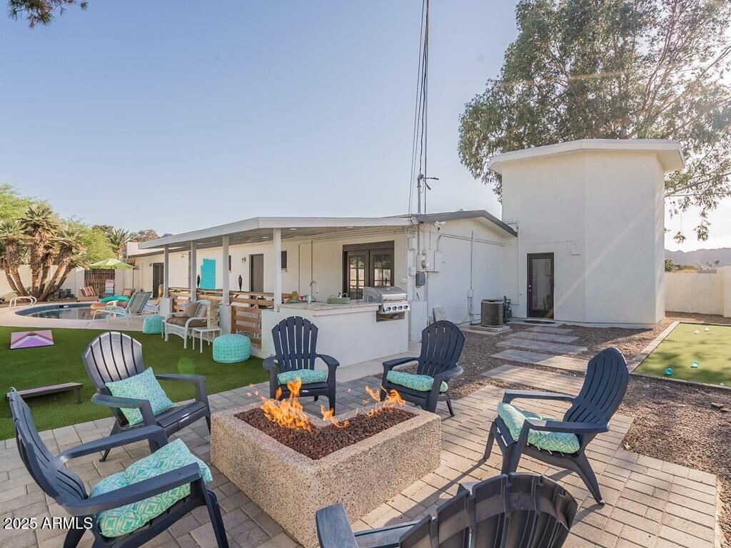 3302 East Turquoise Avenue Phoenix, AZ 85028 - Photo 44 of 59 a outdoor space with furniture and garden view