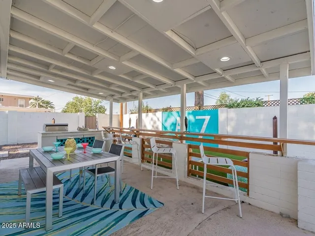 a view of kitchen appliances and window