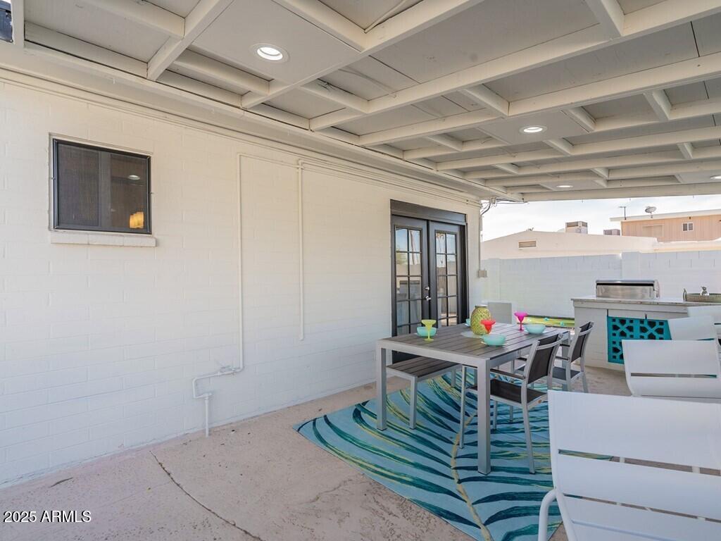 3302 East Turquoise Avenue Phoenix, AZ 85028 - Photo 48 of 59 a view of a dining room with furniture