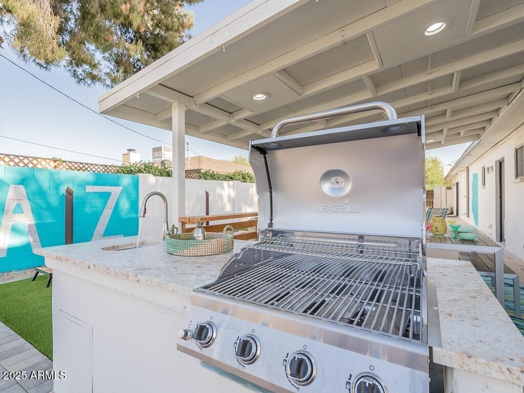 3302 East Turquoise Avenue Phoenix, AZ 85028 - Photo 55 of 59 a view of kitchen appliances and window