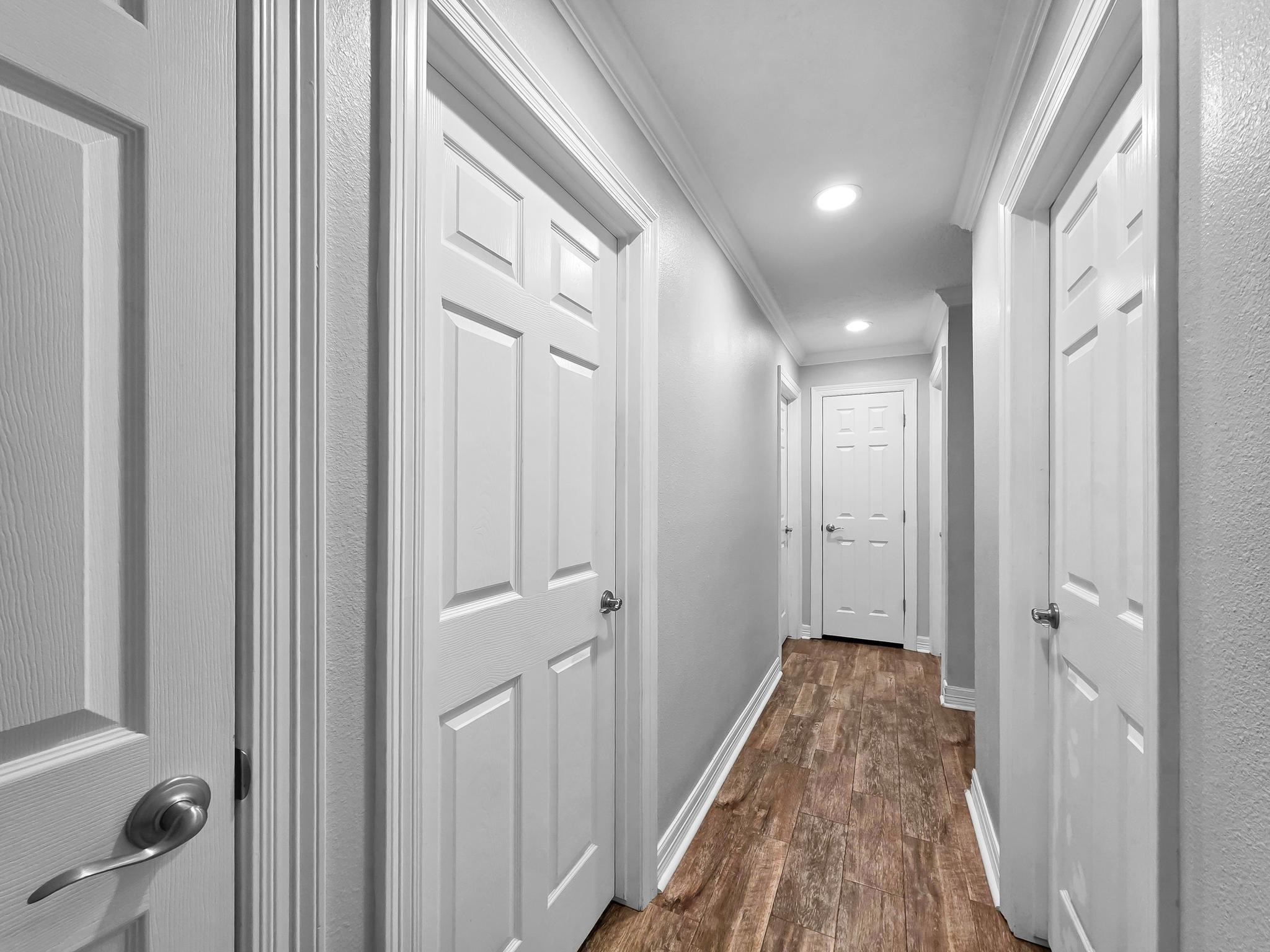 2641 Oilla Road Orange, TX 77630 - Photo 22 of 50 a view of a hallway with wooden floor and closet area