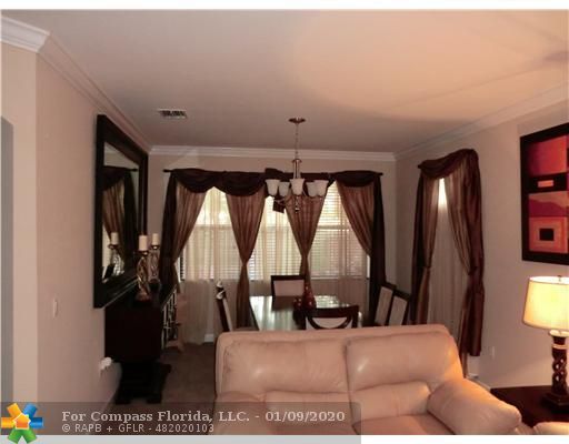 23683 Southwest 113th Avenue Homestead, FL 33032 - Photo 9 of 11 Dining Room