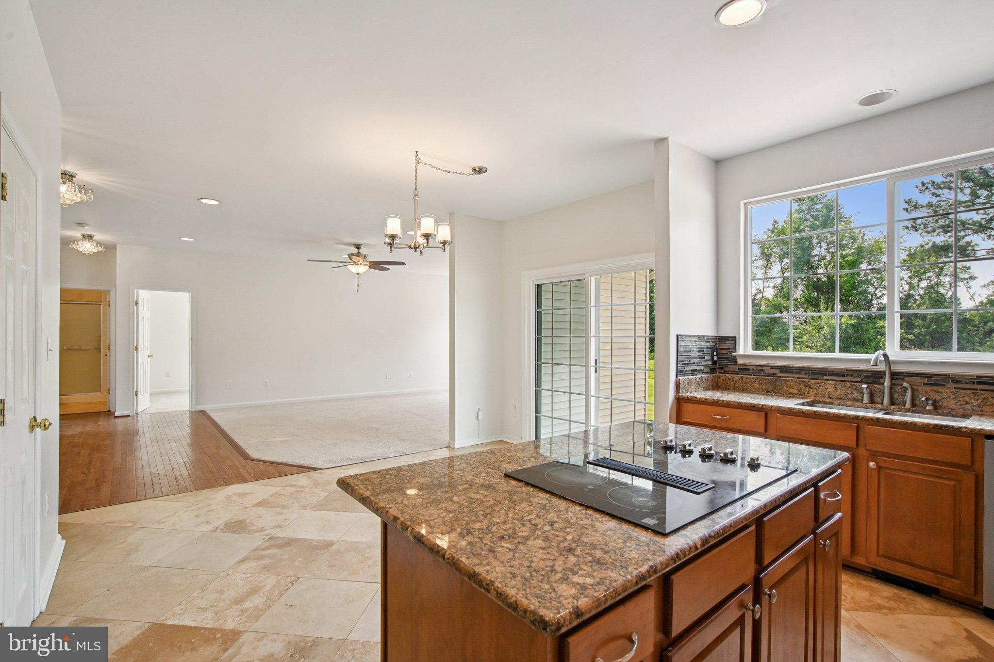 1624 Osprey Circle Cambridge, MD 21613 - Photo 16 of 45 a kitchen with a sink and a stove