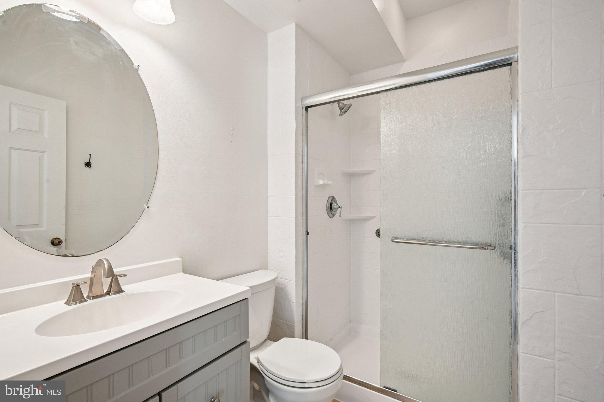 1624 Osprey Circle Cambridge, MD 21613 - Photo 23 of 45 a bathroom with a sink toilet and shower