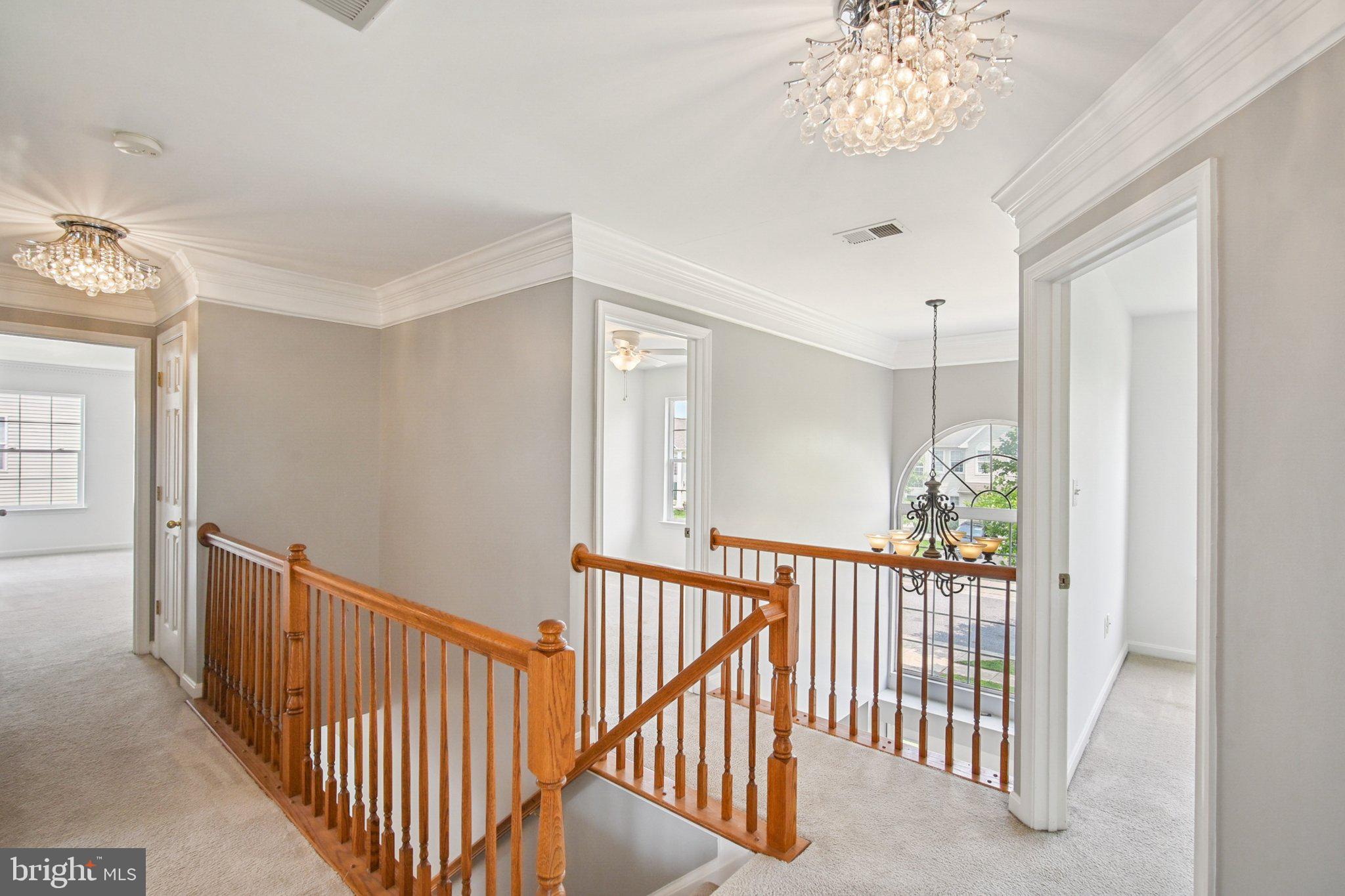 1624 Osprey Circle Cambridge, MD 21613 - Photo 28 of 45 a view of a hallway to a livingroom with furniture