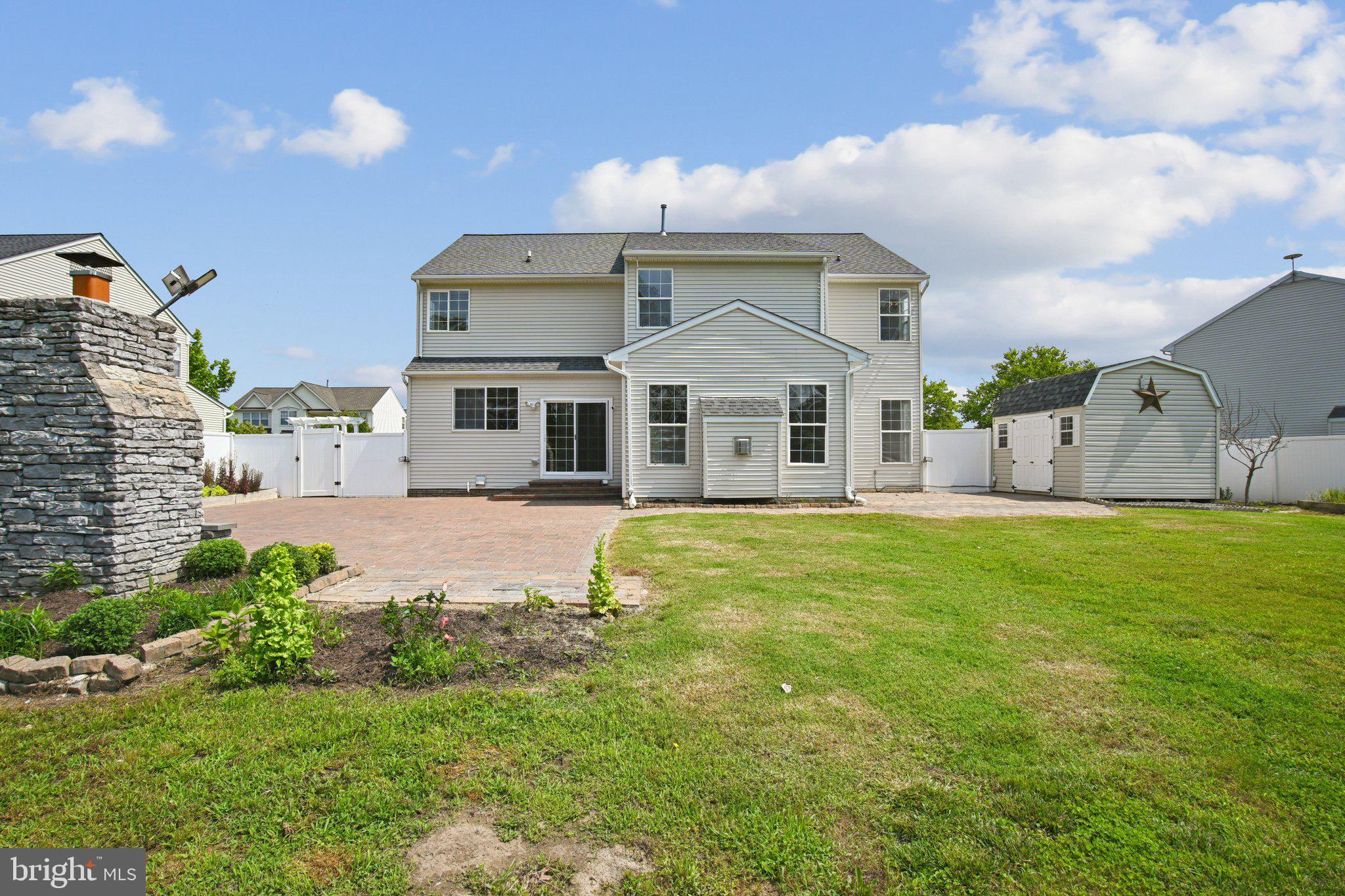 1624 Osprey Circle Cambridge, MD 21613 - Photo 43 of 45 a front view of a house with a garden