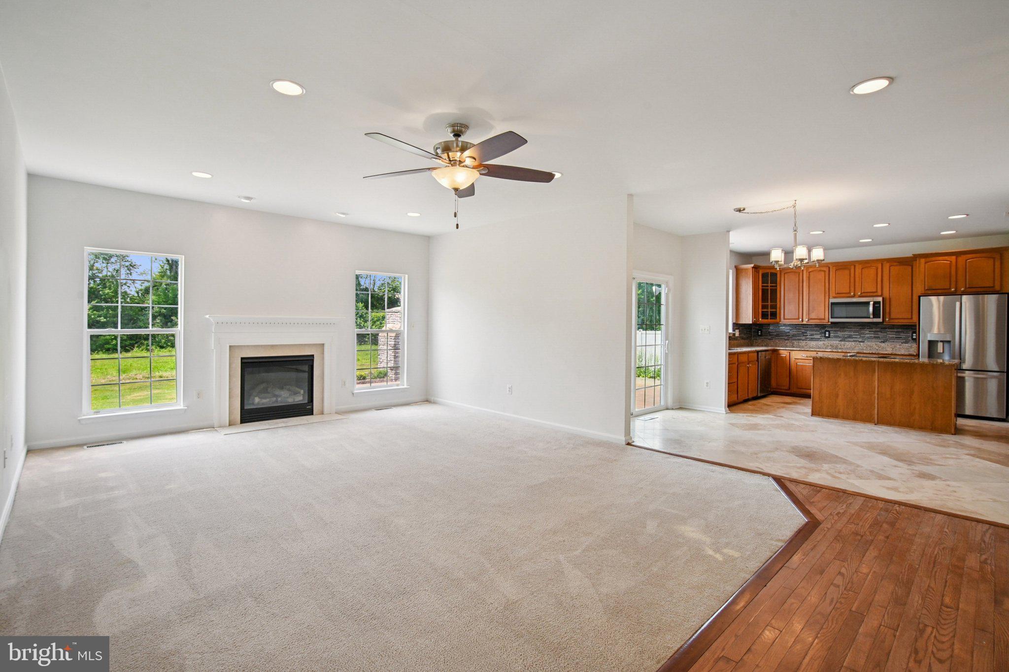 1624 Osprey Circle Cambridge, MD 21613 - Photo 6 of 45 a view of an empty room with a window and a kitchen