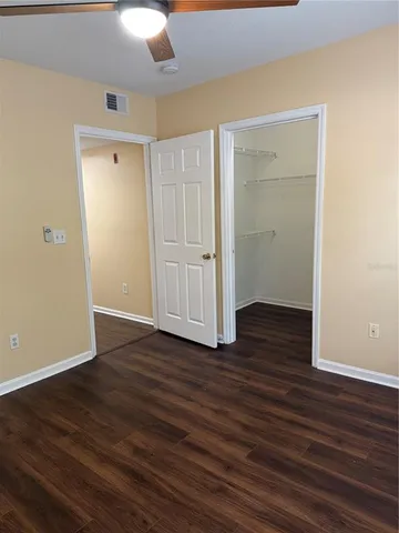 a view of an empty walk in closet