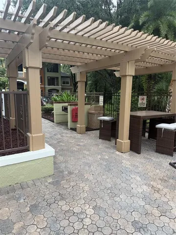 a view of a swimming pool with a patio