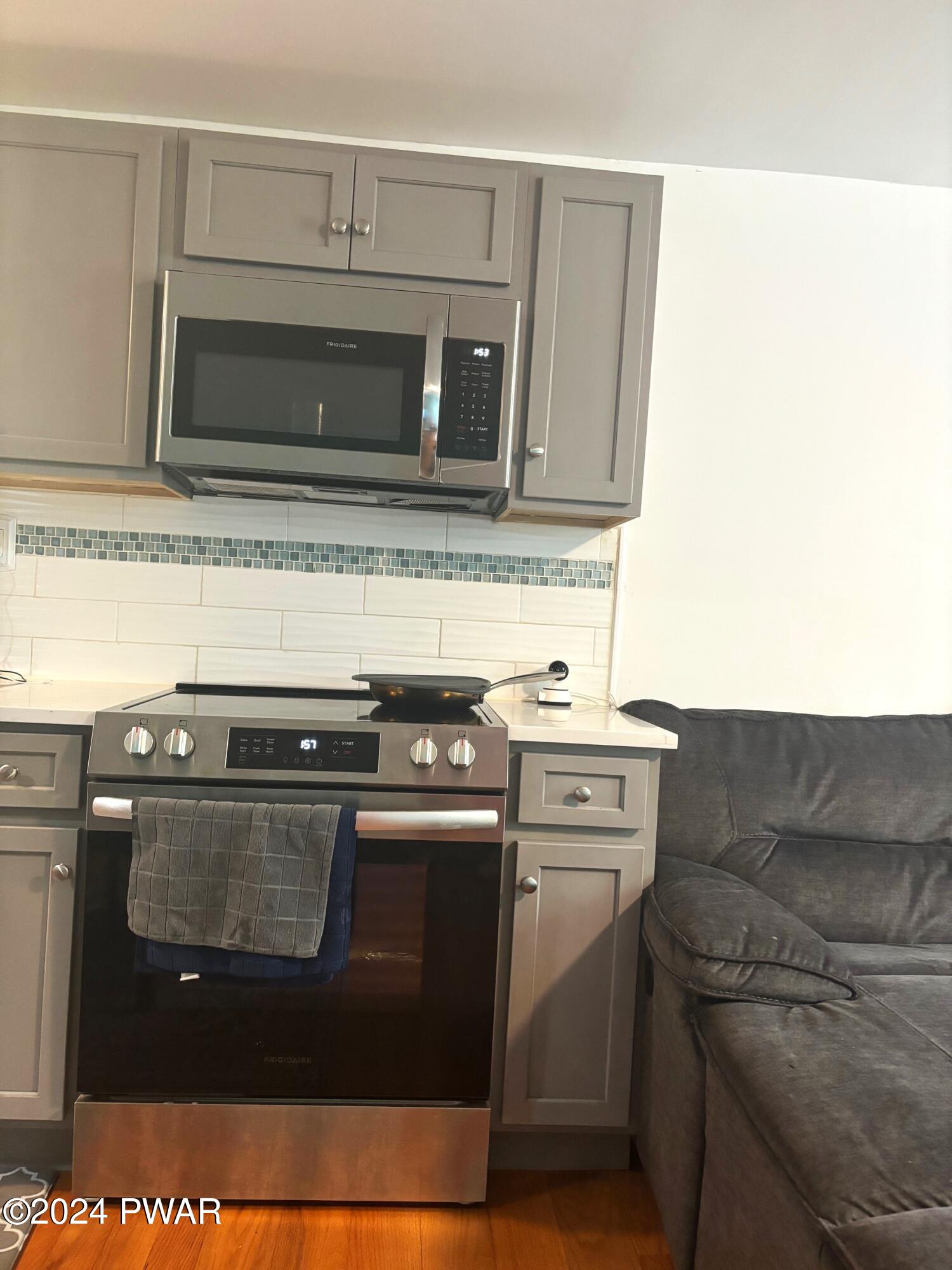 1113 Bracts Road Effort, PA 18330 - Photo 18 of 27 a stove top oven sitting inside of a kitchen
