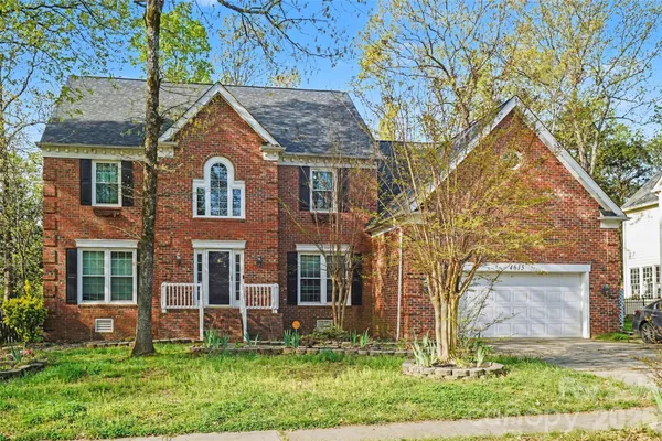 front view of house with a yard