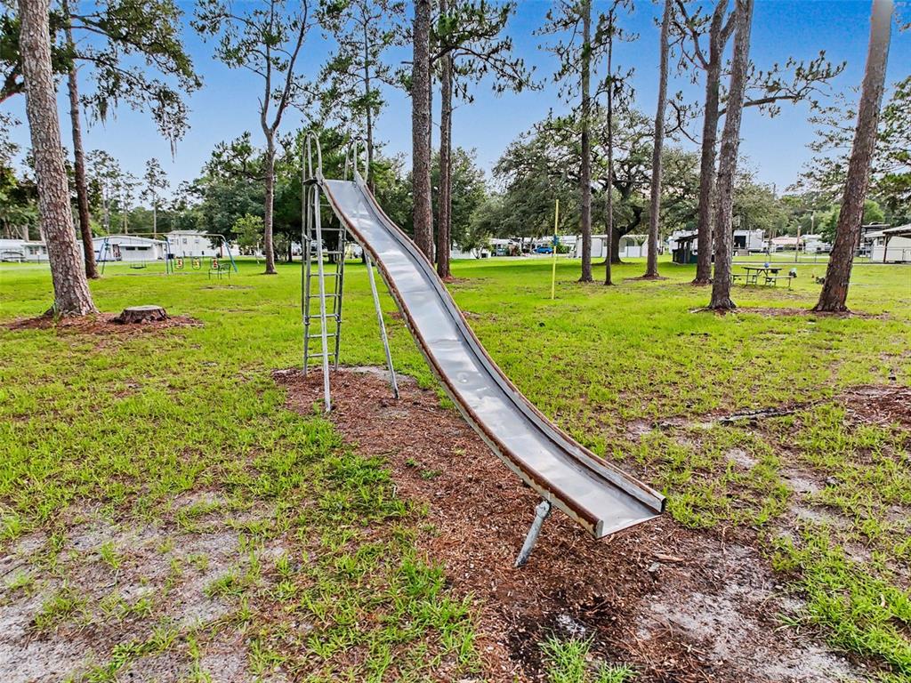 2092 Culbreath Road, Unit A42 Brooksville, FL 34602 - Photo 25 of 70 a view of a park with large trees