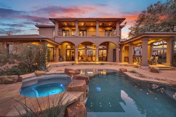 a view of a building with a swimming pool