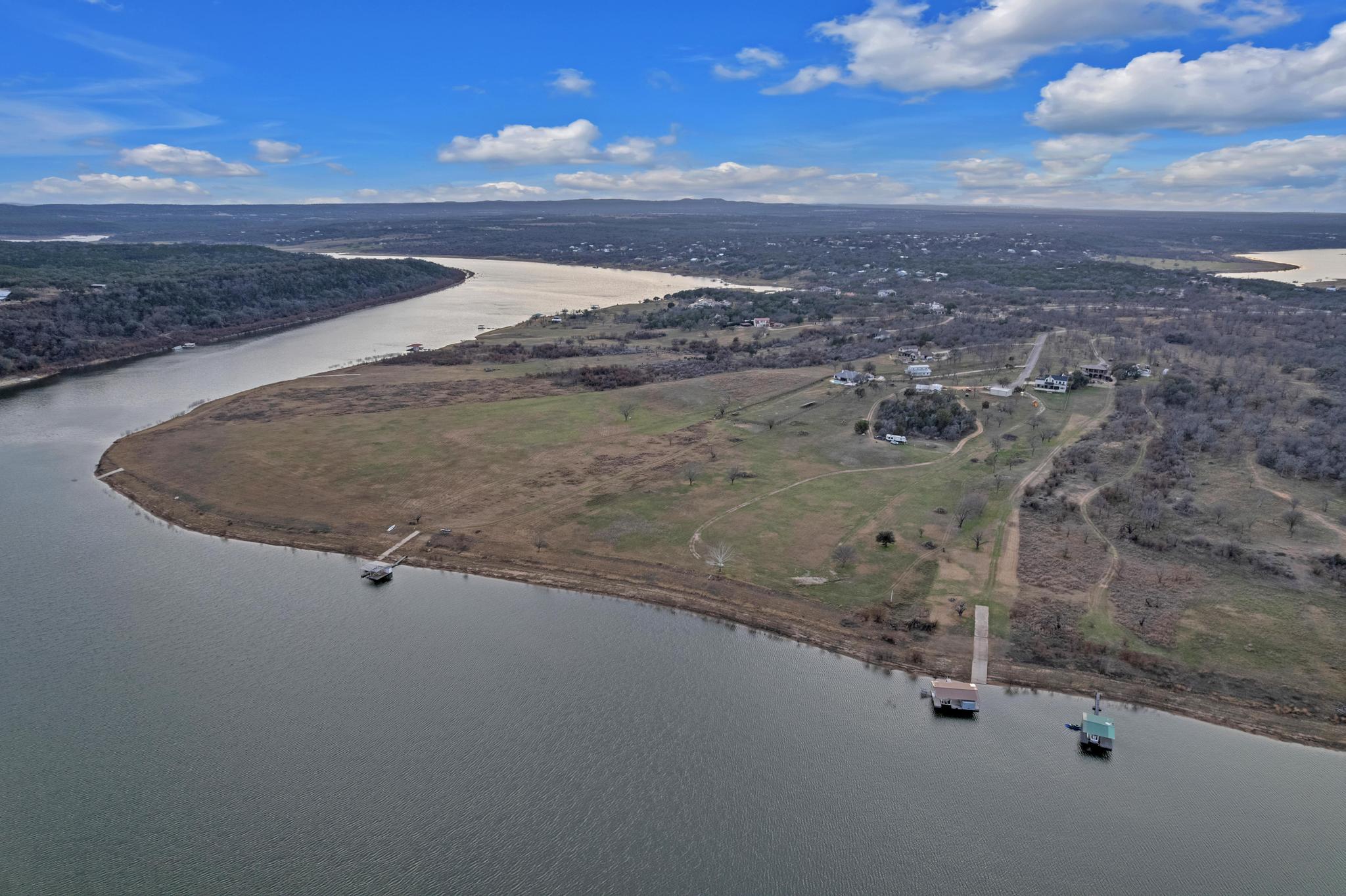 303 Yaupon Road Spicewood, TX 78669 - Photo 32 of 39 Drone / aerial view of a nearby body of water