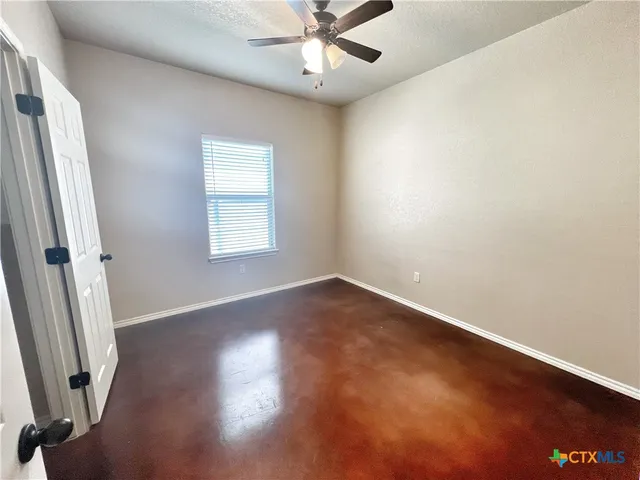 a view of a backyard of the house