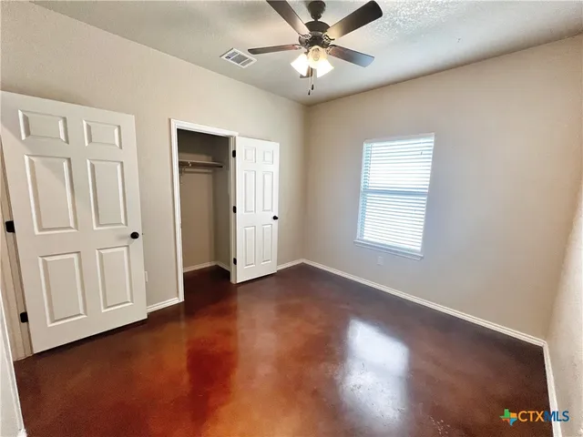 a house view with a backyard space
