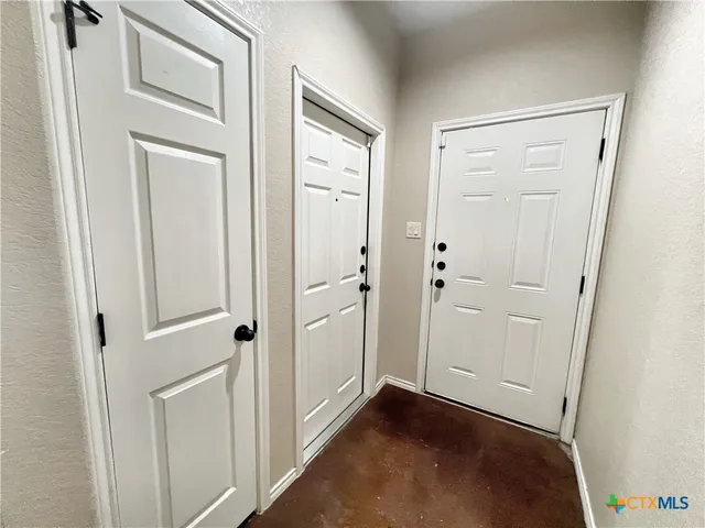 a open kitchen with a refrigerator a sink and a stove