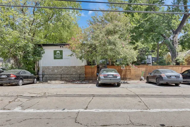 a car parked in front of a house