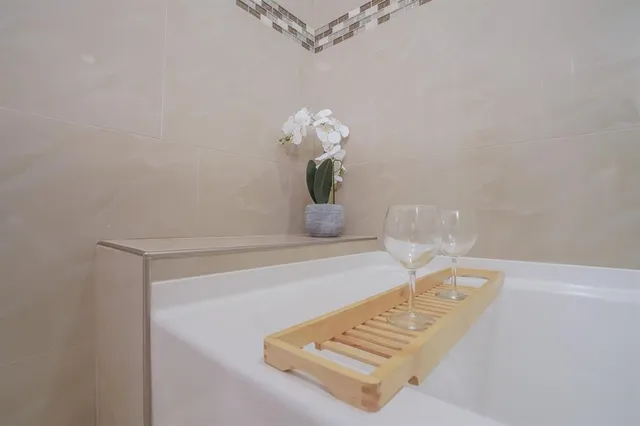 a view of a living room and a floor to ceiling window