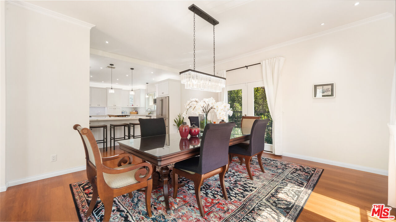 2655 Saxon Drive Los Angeles, CA 90065 - Photo 11 of 40 a view of a dining room with furniture and wooden floor