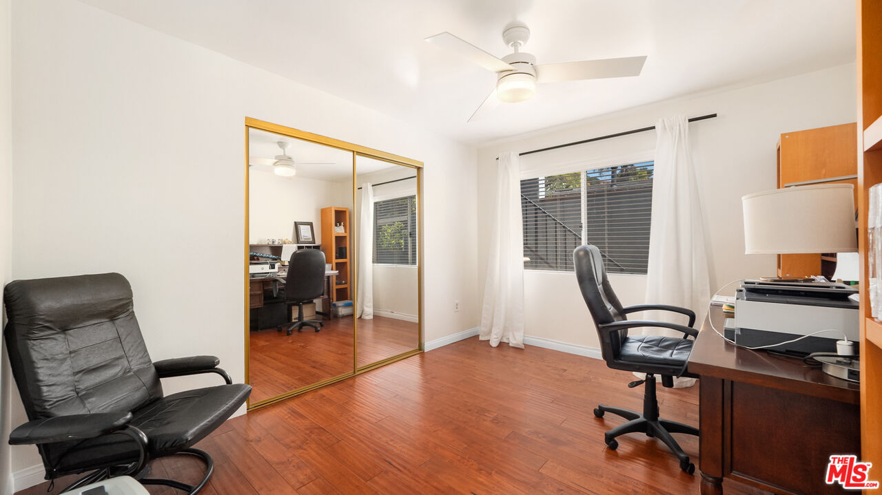 2655 Saxon Drive Los Angeles, CA 90065 - Photo 18 of 40 a view of a workspace with furniture and a workspace