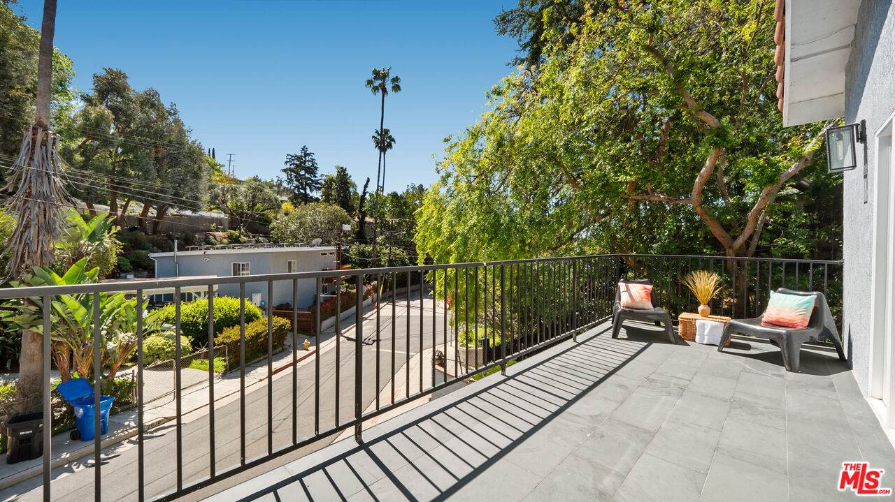 2655 Saxon Drive Los Angeles, CA 90065 - Photo 19 of 40 a view of a balcony with chairs