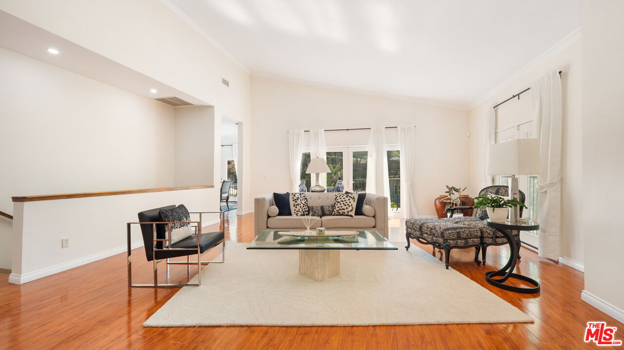 2655 Saxon Drive Los Angeles, CA 90065 - Photo 7 of 40 a living room with furniture and a wooden floor