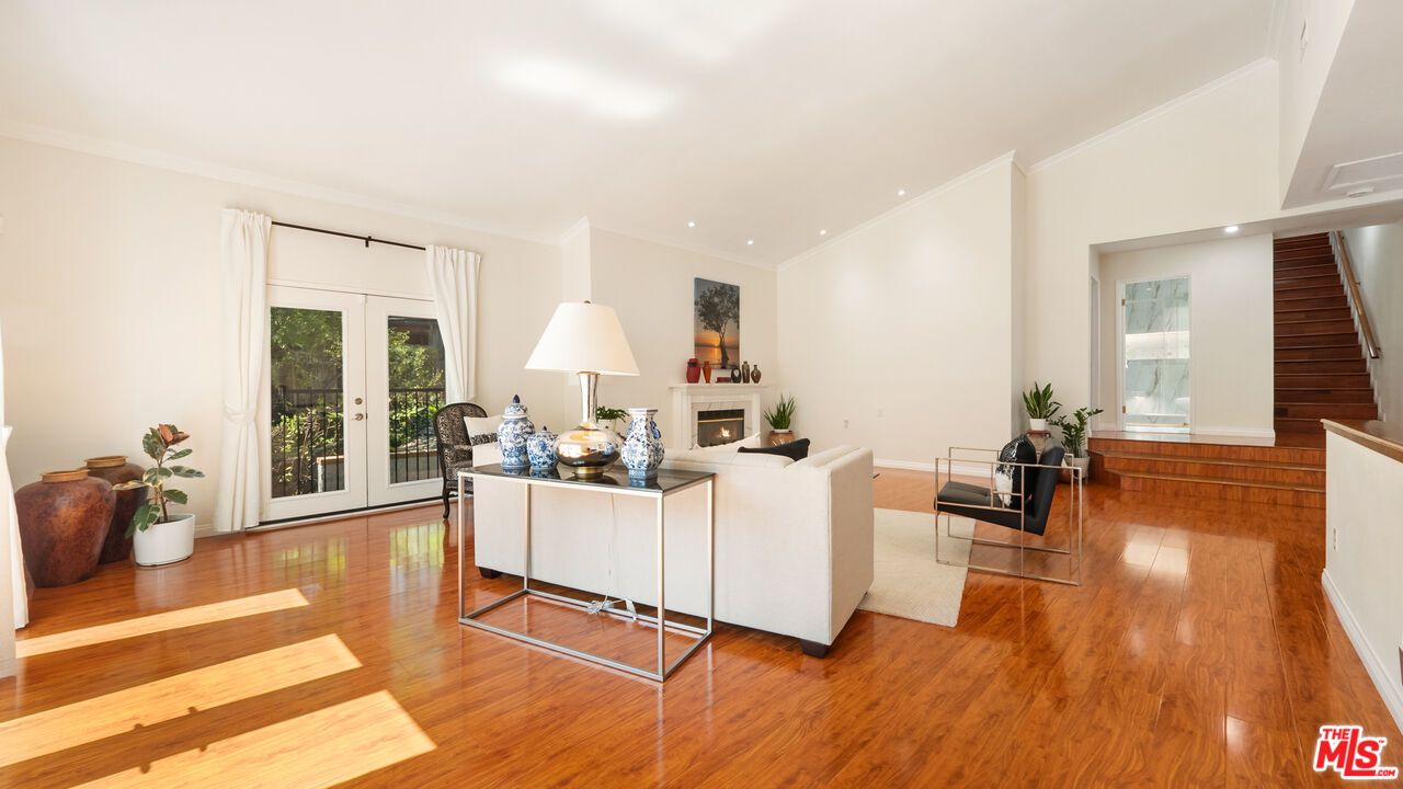 2655 Saxon Drive Los Angeles, CA 90065 - Photo 8 of 40 a living room with furniture and a wooden floor