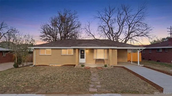 front view of house with a yard