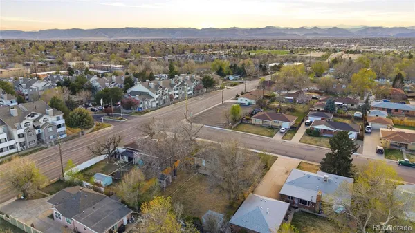 an aerial view of residential house with outdoor space