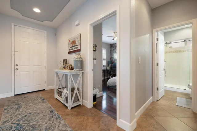 a view of room with window and cabinet
